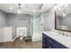 Updated bathroom with marble countertops, a glass shower, and modern fixtures at 220 Drumcliff Ct, Tyrone, GA 30290