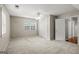 Bedroom with window, closet, and doorway to another room at 220 Drumcliff Ct, Tyrone, GA 30290