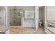 Bright main bathroom with separate shower and tub at 220 Drumcliff Ct, Tyrone, GA 30290