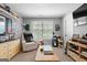Cozy bonus room with neutral walls and carpet with natural light at 130 Edgewater Trl, Fayetteville, GA 30215