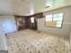 Spacious kitchen needs renovation with damaged walls, flooring and windows, potential for a custom design at 4274 Kimball Sw Rd, Atlanta, GA 30331