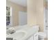 Bright bathroom featuring neutral walls, a sink vanity, toilet, and walk-in shower at 264 Keller Dr, Mcdonough, GA 30252