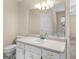 Bathroom featuring a white vanity and a view into the bathtub at 264 Keller Dr, Mcdonough, GA 30252