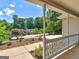 A cozy front porch view with manicured front gardens in view at 264 Keller Dr, Mcdonough, GA 30252