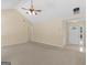Bright living room with neutral colored walls and carpet at 264 Keller Dr, Mcdonough, GA 30252