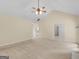 Bright living room with access to the kitchen and other rooms at 264 Keller Dr, Mcdonough, GA 30252