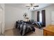 Cozy bedroom features two twin beds with stylish blue patterned bedding and modern décor at 7435 Ansley Park Way, Cumming, GA 30028