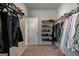 Walk-in closet featuring wire shelving and plenty of space, offering efficient organization for clothes and shoes at 7435 Ansley Park Way, Cumming, GA 30028