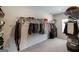 Walk-in closet with wire shelving and ample storage space for clothes, shoes, and accessories at 7435 Ansley Park Way, Cumming, GA 30028