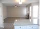 Open living room with cozy fireplace and large windows, perfect for Gathering gatherings at 7564 Mountain Ridge Ln, Lithonia, GA 30058
