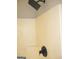 Shower stall with a dark rain shower head and neutral wall paneling at 7564 Mountain Ridge Ln, Lithonia, GA 30058