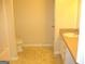 Bathroom with tile floors, standard fixtures and vanity is simple and clean at 4000 Orchard Hill Ter, Stone Mountain, GA 30083