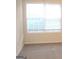 Neutral bedroom with window, carpet, and baseboards is bright and cheery at 4000 Orchard Hill Ter, Stone Mountain, GA 30083