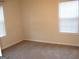 Bedroom with neutral walls, carpet and two windows is bland but functional at 4000 Orchard Hill Ter, Stone Mountain, GA 30083