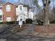 Exterior of building with visible unit numbers and landscaping near the entrance at 4000 Orchard Hill Ter, Stone Mountain, GA 30083