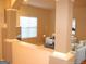 Bright living room featuring a fireplace, comfortable seating, neutral decor and bright natural lighting at 4000 Orchard Hill Ter, Stone Mountain, GA 30083