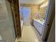 Bathroom with a soaking tub, separate shower, and double vanity with a shower at 5627 Isleworth Ct, Atlanta, GA 30349