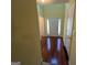 Bright entryway with hardwood floors, a glass-paneled front door, and neutral wall color at 5627 Isleworth Ct, Atlanta, GA 30349