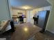 Efficient kitchen with white cabinets, a stainless steel range, and ample counter space at 5627 Isleworth Ct, Atlanta, GA 30349