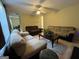 Inviting living room with warm lighting, generous seating, and an open layout at 5627 Isleworth Ct, Atlanta, GA 30349