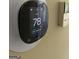 Close up of an Ecobee digital thermostat displaying the indoor temperature at 5627 Isleworth Ct, Atlanta, GA 30349