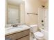 Bathroom features granite vanity, sink, toilet, and tub with shower at 171 Osier Dr, Mcdonough, GA 30252