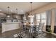 This dining area features a wooden table, chairs, and natural light at 171 Osier Dr, Mcdonough, GA 30252