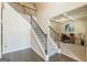 Foyer with hardwood floors and a staircase leading to the second floor at 171 Osier Dr, Mcdonough, GA 30252