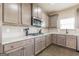 This kitchen features granite countertops and stainless steel appliances at 171 Osier Dr, Mcdonough, GA 30252