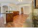 Open concept kitchen with breakfast bar and views of the dining and living areas at 70 Country Meadows Ln, Covington, GA 30014