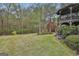 Expansive backyard featuring a wooded backdrop and upper level gazebo at 1000 Pleasance Grv, Peachtree City, GA 30269