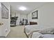 Basement featuring a bed, exercise equipment, and room for different uses at 1000 Pleasance Grv, Peachtree City, GA 30269