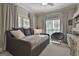Bedroom with natural light, daybed and chair seating at 1000 Pleasance Grv, Peachtree City, GA 30269