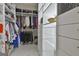 Organized walk-in closet with ample storage and custom shelving at 1000 Pleasance Grv, Peachtree City, GA 30269