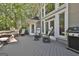 Inviting deck with ample seating, a grill, and easy access to the interior, perfect for entertaining at 1000 Pleasance Grv, Peachtree City, GA 30269