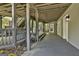 Back of home featuring covered deck with stairs leading to the backyard at 1000 Pleasance Grv, Peachtree City, GA 30269