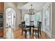 Bright dining area with glass table, chairs, and natural light at 1000 Pleasance Grv, Peachtree City, GA 30269