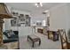 Relaxing living area featuring built-in bookcase and game table at 1000 Pleasance Grv, Peachtree City, GA 30269