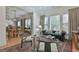 Inviting living room featuring a plush green couch, stylish chairs, and a detailed oriental rug at 1000 Pleasance Grv, Peachtree City, GA 30269