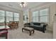 Comfortable living room featuring sofa, coffee table, and natural light at 1000 Pleasance Grv, Peachtree City, GA 30269