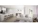 Open-concept living area featuring a modern kitchen, dining space, and comfortable living room at 2276 Santa Fe St # 19, Morrow, GA 30260