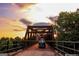 View of a bridge with metal beams, a vehicle, and scenic sky background, promoting local infrastructure at 606 Ridgelake Dr, Peachtree City, GA 30269