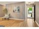 Bright entryway with hardwood floors and a view of the neighborhood at 606 Ridgelake Dr, Peachtree City, GA 30269