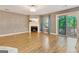 Inviting living room with fireplace, hardwood floors and a view of the balcony at 606 Ridgelake Dr, Peachtree City, GA 30269