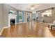 Spacious living room with hardwood floors, fireplace, and sliding door to the patio at 606 Ridgelake Dr, Peachtree City, GA 30269