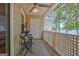 Covered patio featuring outdoor furniture, a ceiling fan and water views at 606 Ridgelake Dr, Peachtree City, GA 30269