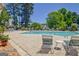 Community pool with ample seating and a tranquil atmosphere at 606 Ridgelake Dr, Peachtree City, GA 30269