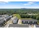 Aerial view of new townhome community with mountain backdrop at 823 Mackay Crk, Woodstock, GA 30188