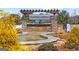 A stone community sign for Ridgewalk Landing sits above a waterfall at 823 Mackay Crk, Woodstock, GA 30188