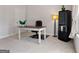 Comfortable home office with desk, lamp and storage at 823 Mackay Crk, Woodstock, GA 30188